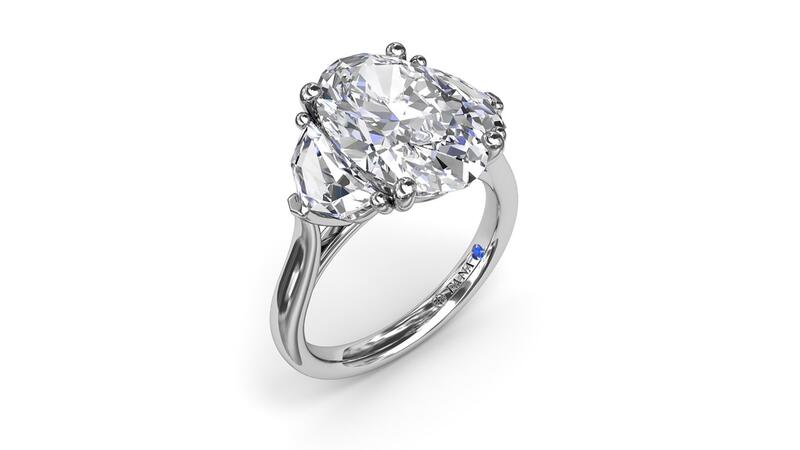 Fana three-stone engagement ring