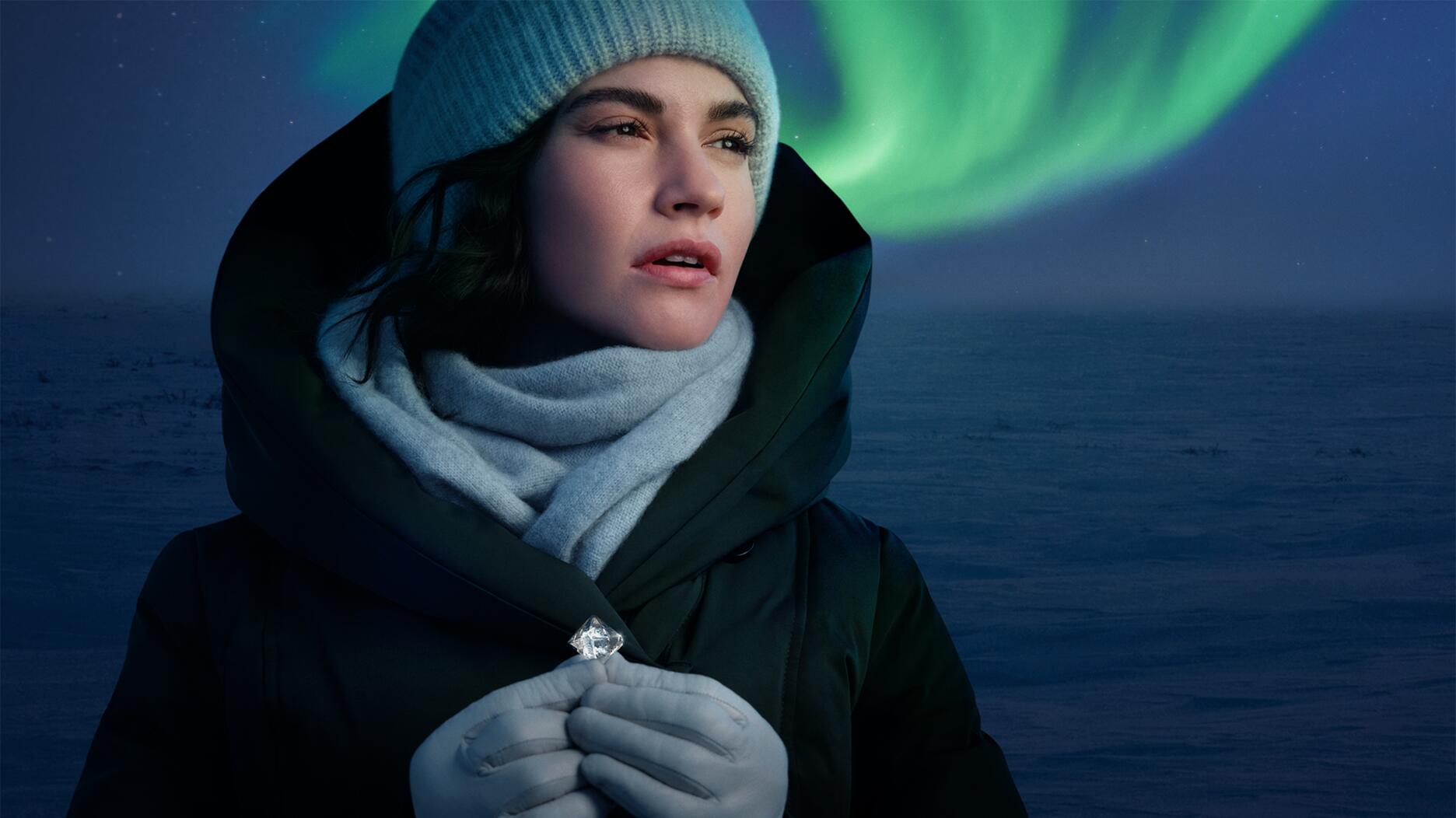 Actress Lily James with a rough diamond and the Northern Lights