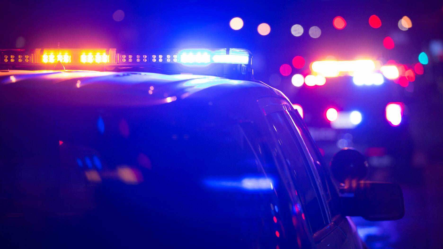 Stock image of police car with lights on