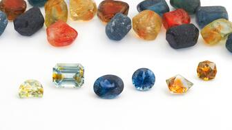 Cut and rough colored gemstones